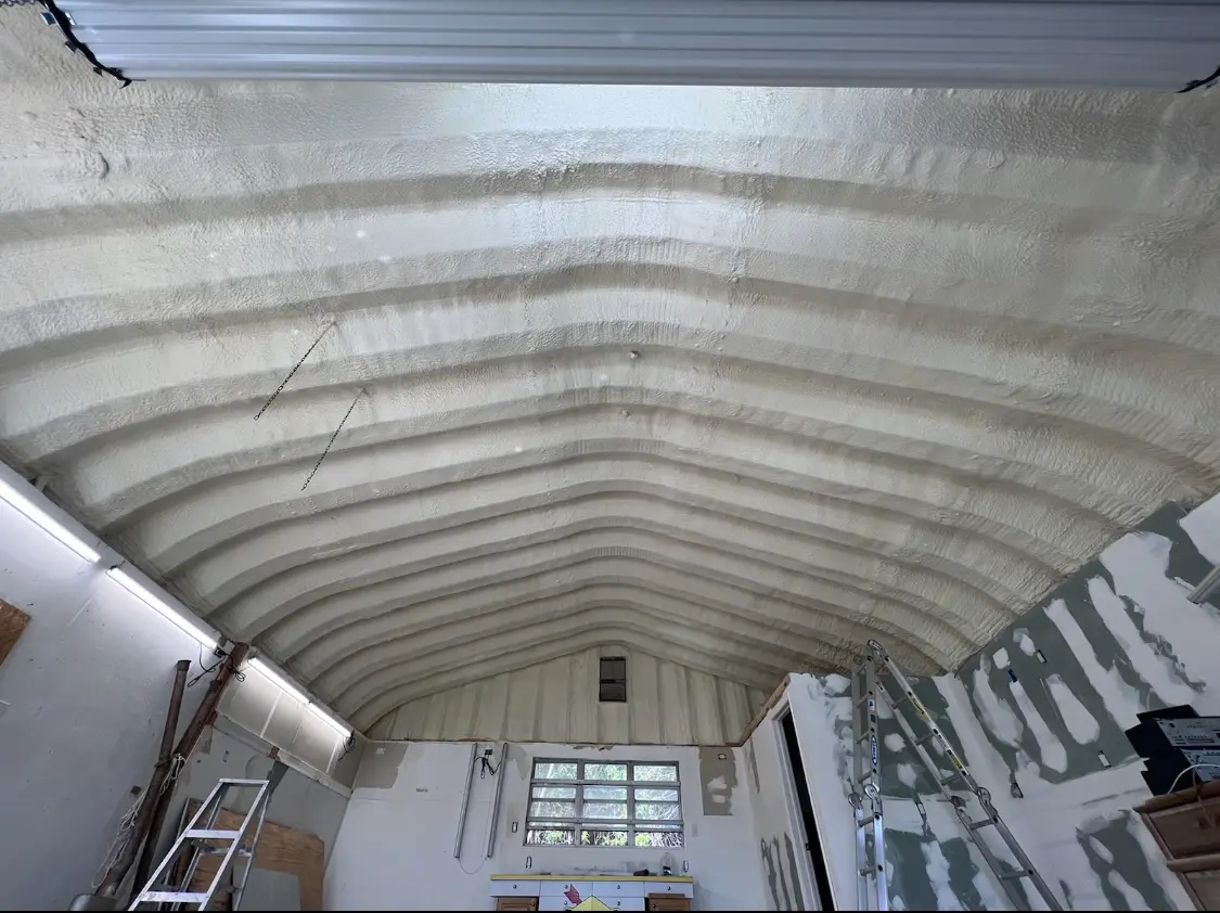 Spray polyurethane foam applied to the underside of a metal roof deck in Indian Trail